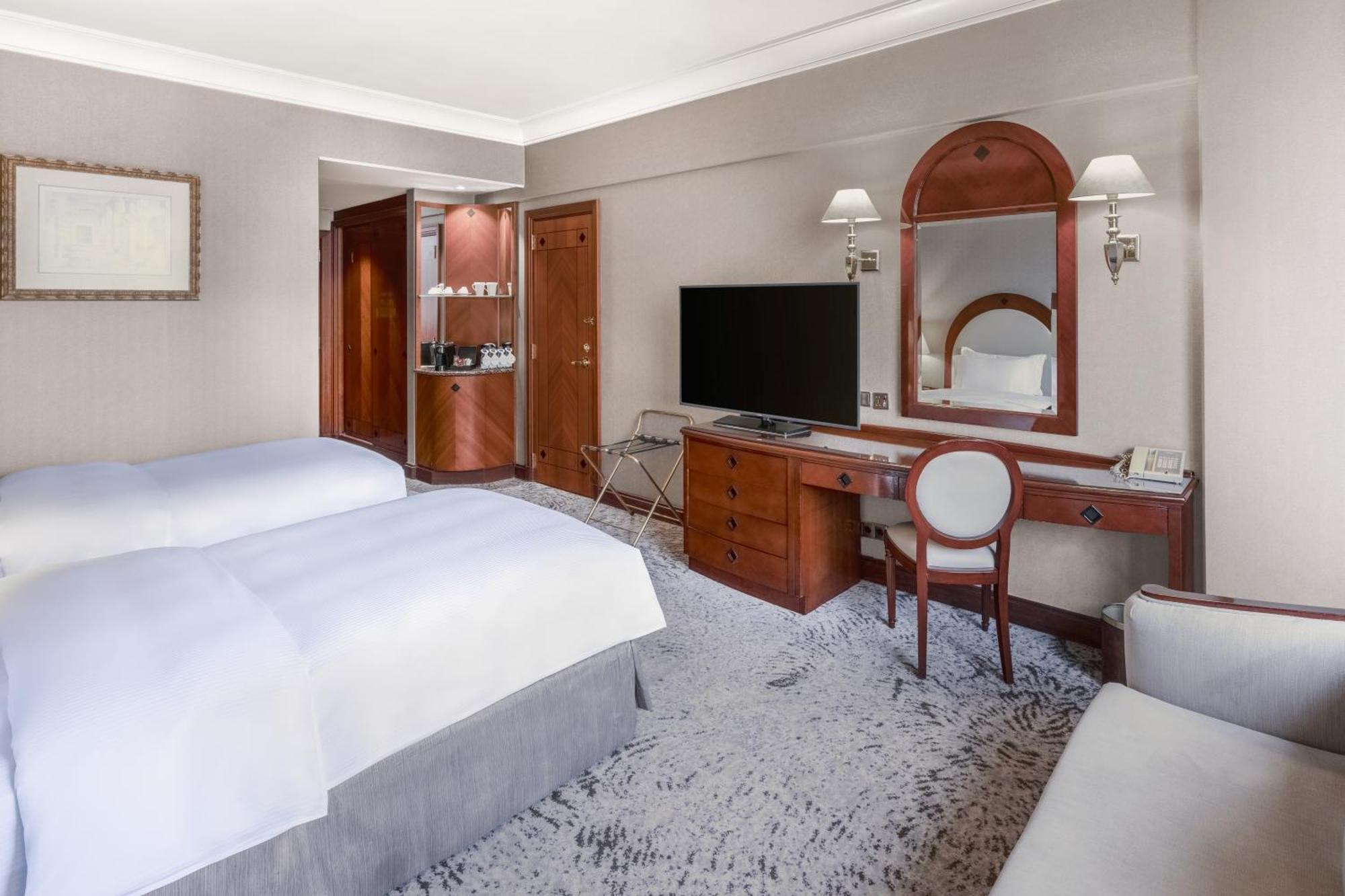 Madinah Hilton - Deluxe hotel room interior near Masjid Nabawi, Islamic heritage accommodation amenities