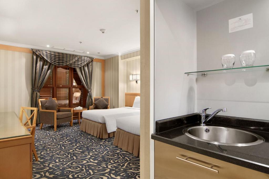 Makkah Towers - Luxury room interior with Haram view, premium Umrah accommodation facilities and amenities