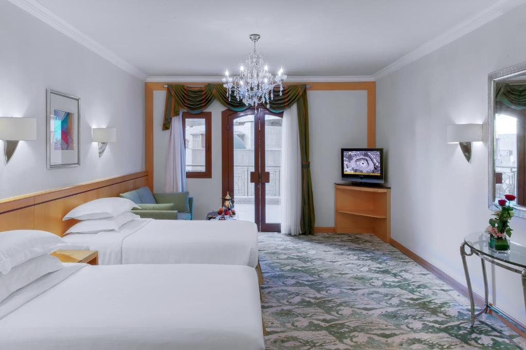 Makkah Towers - Luxury room interior with Haram view, premium Umrah accommodation facilities and amenities