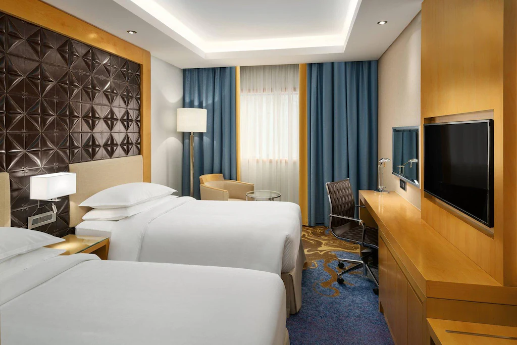 Sheraton Makkah Jabal Al Kaaba Hotel - Luxury room interior with Haram view, premium Umrah accommodation facilities and amenities