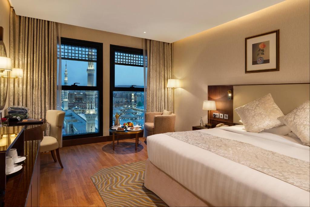 The Oberoi Madina - Deluxe hotel room interior near Masjid Nabawi, Islamic heritage accommodation amenities